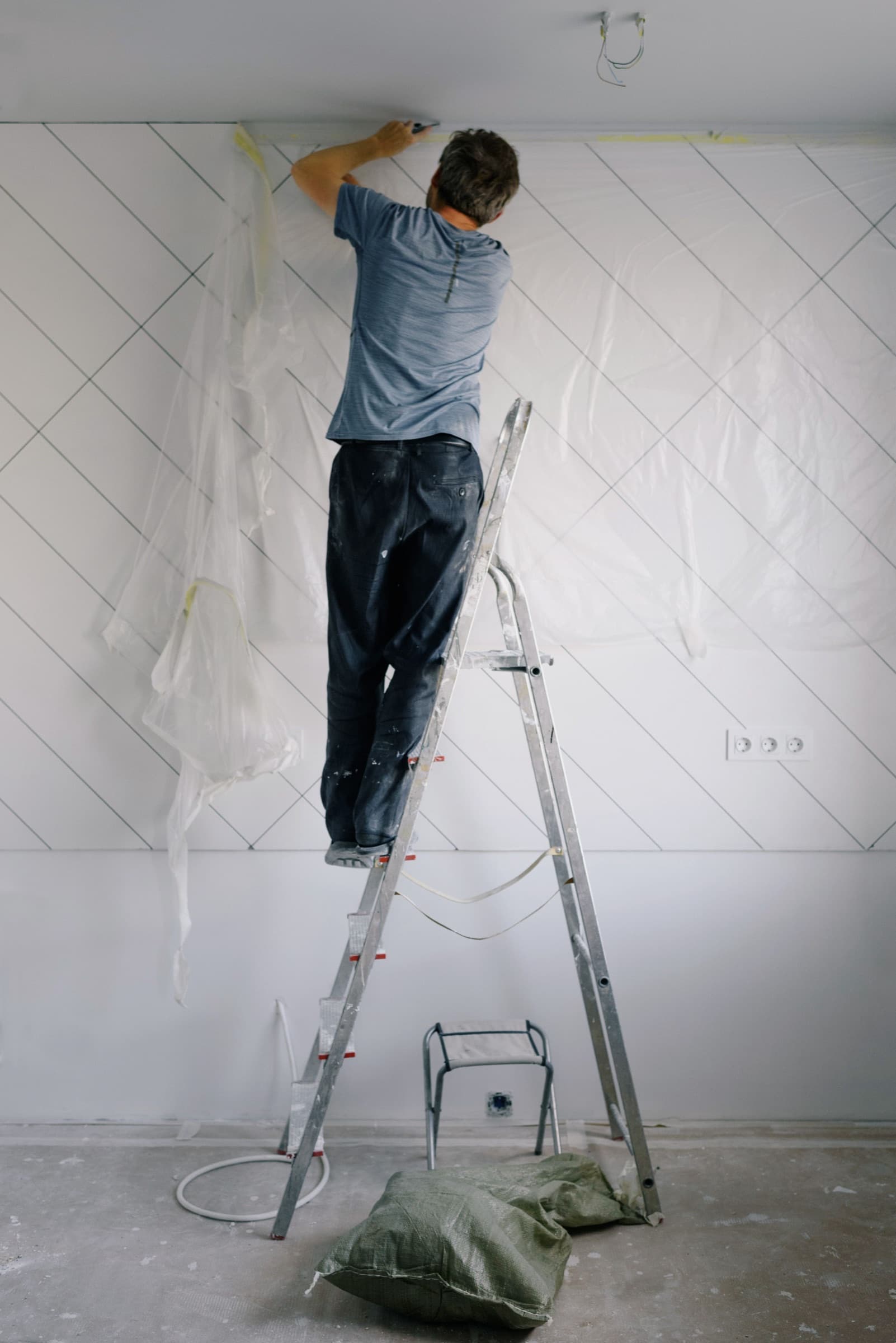 A homeowner preparing a room for renovation